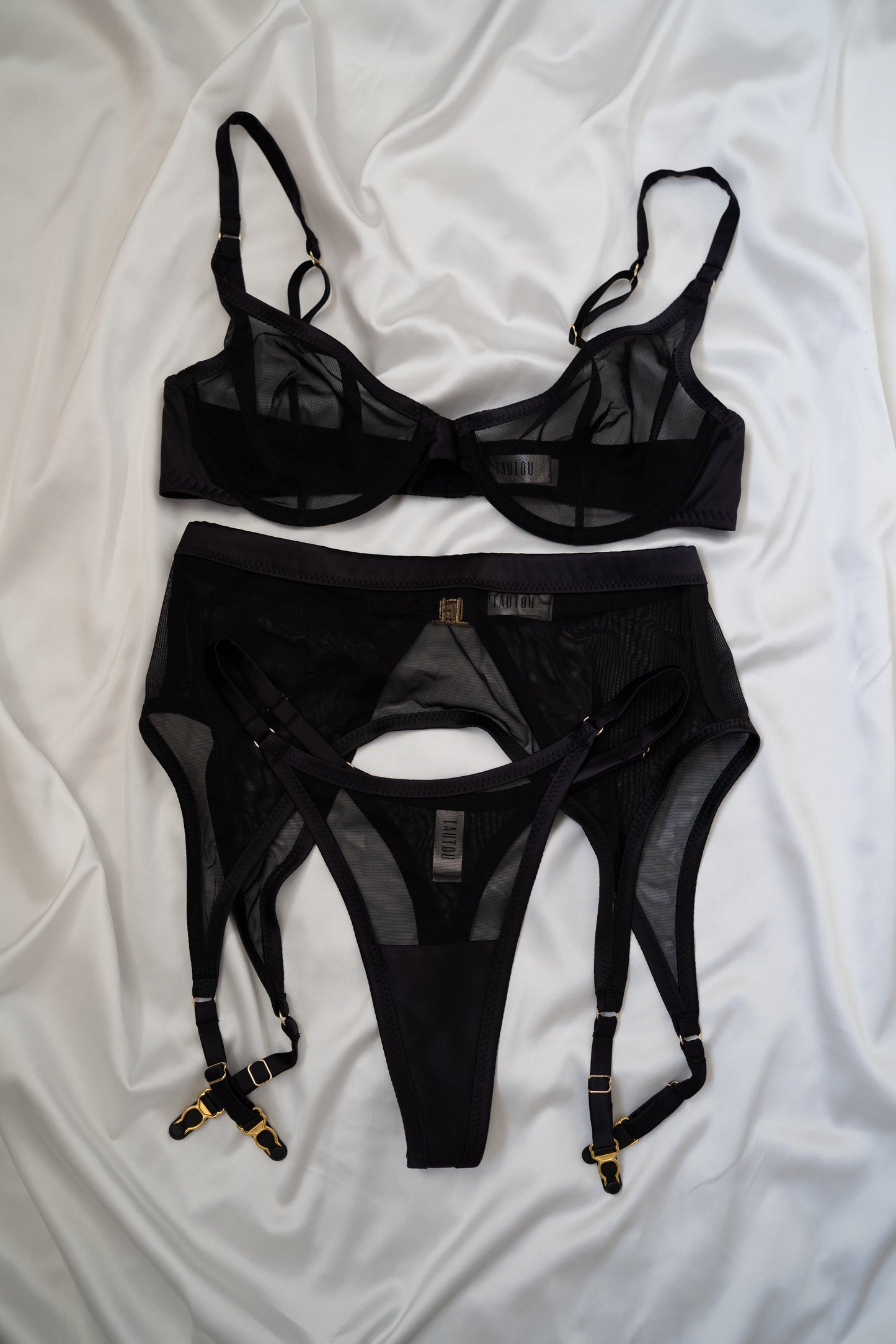 Refined Lines Tate Black mesh lingerie bra and panty flat lay