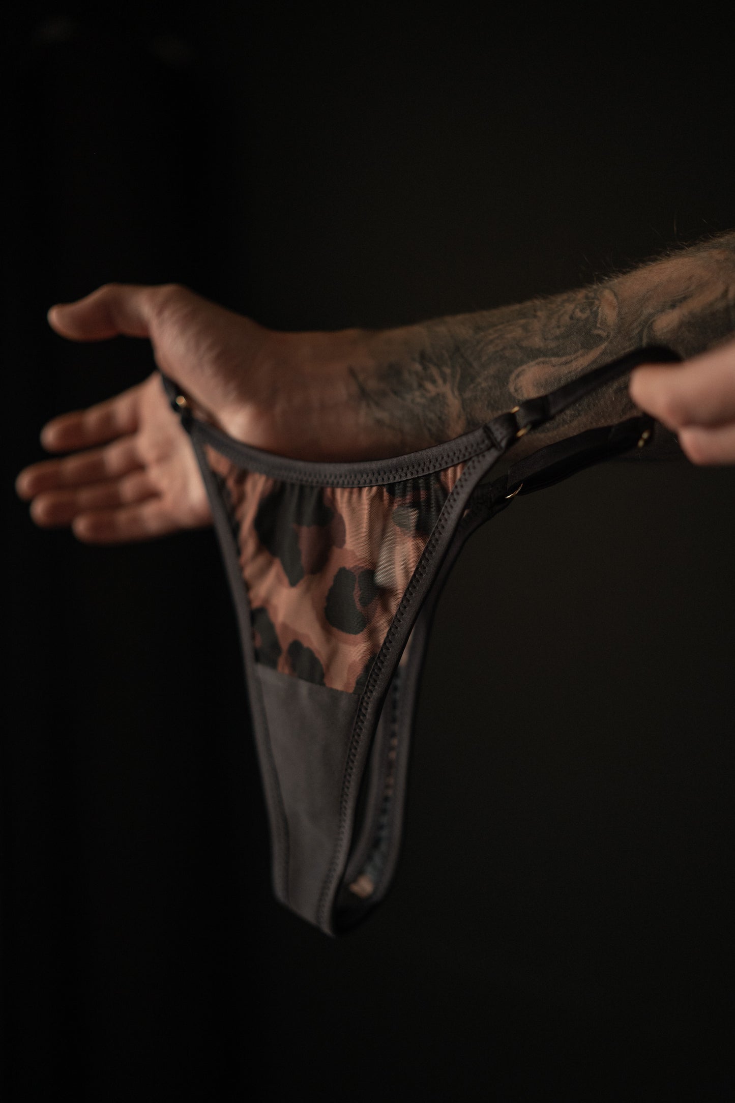 Side view of satin fabric texture and leopard pattern Indi thong