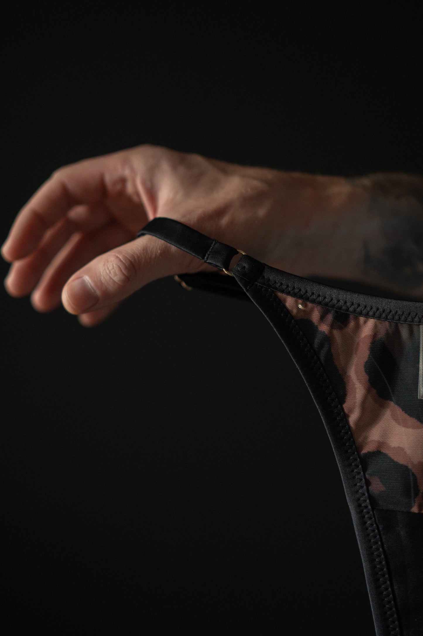 Black stripe of Tatou lingerie minimalist thongs