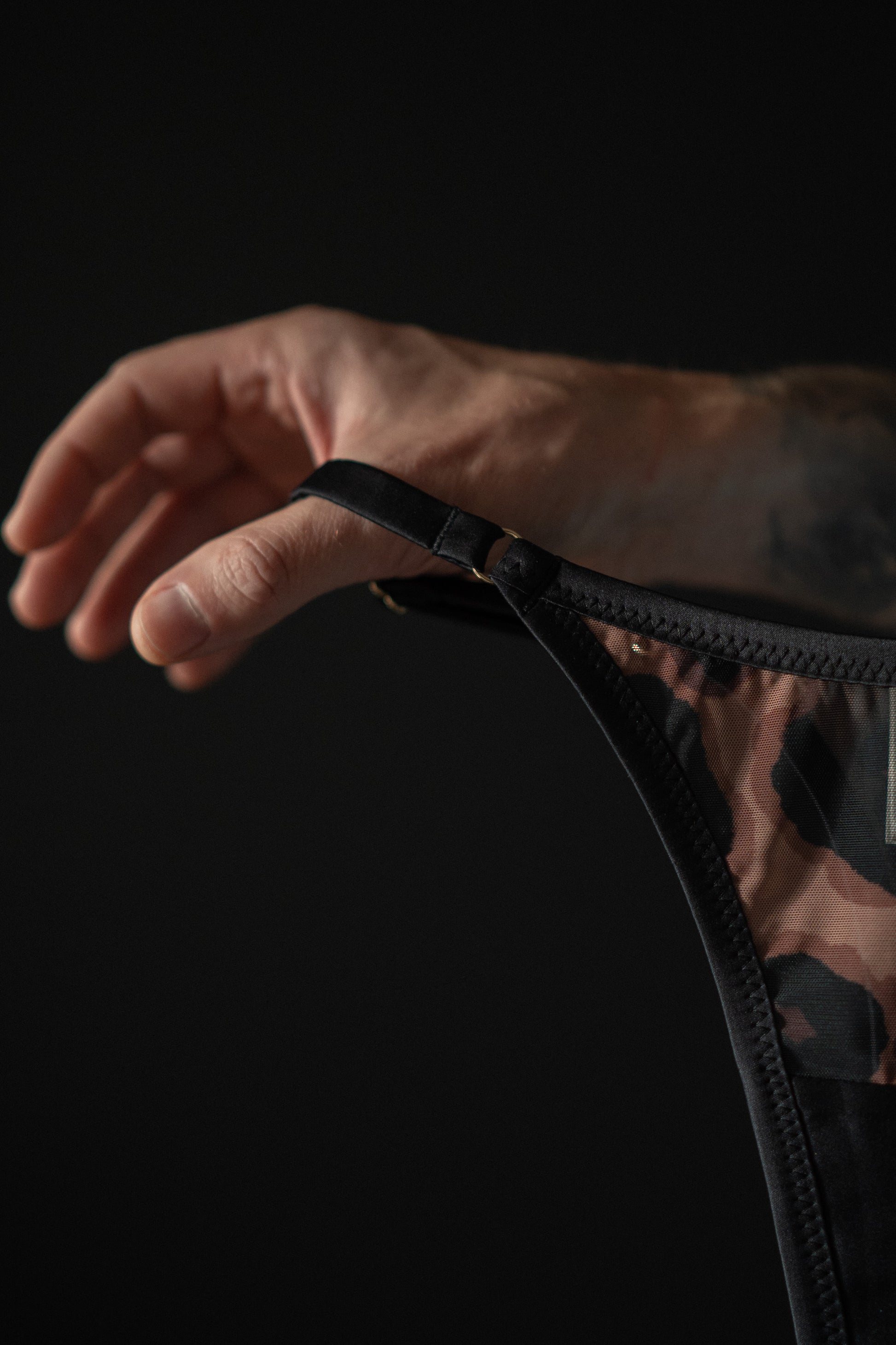 Black stripe of Tatou lingerie minimalist thongs